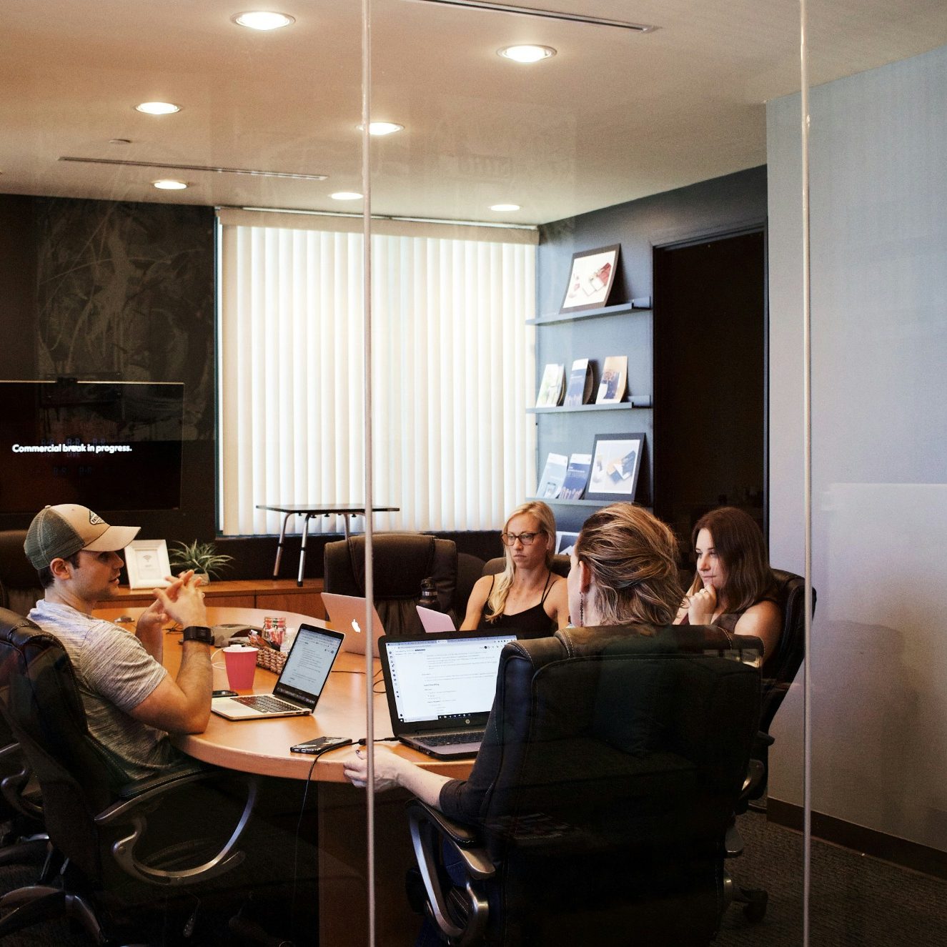 SME, Freelancers, Creatives A small business meeting, or freelancers and creatives assessing financials on FreeAgent in East London, Canary Wharf, Royal Docks, Newham.