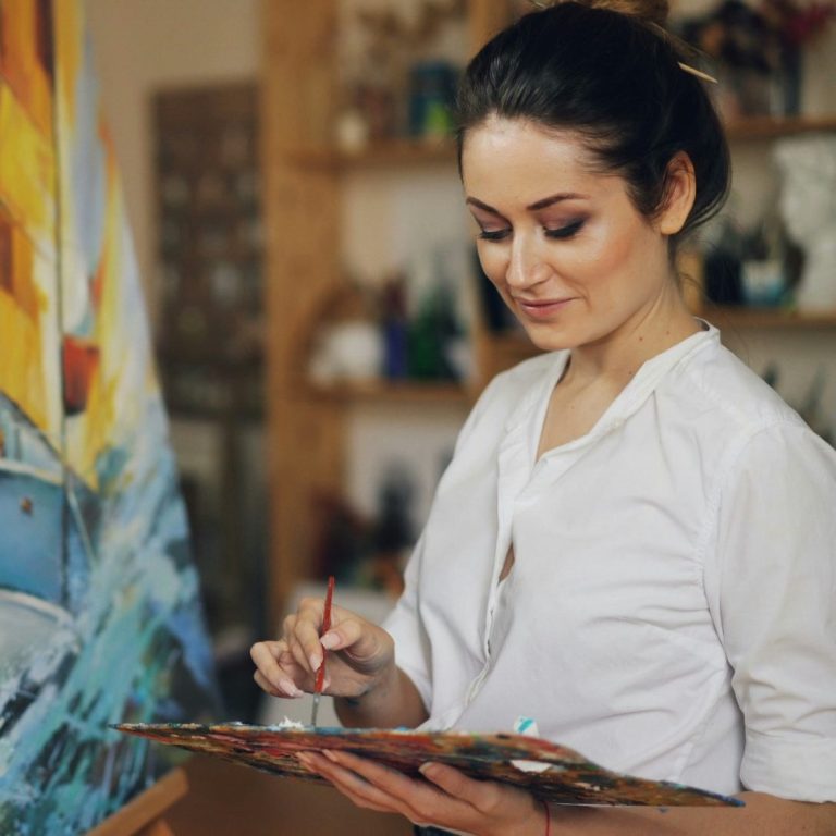 Creative Artist A creative artist painting. East London, Canary Wharf, Stratford, Hackney, Newham, Royal Docks.